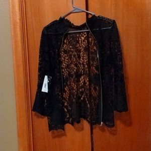 It does not fit me,size small from J.C. Penney. It is black and never been used.